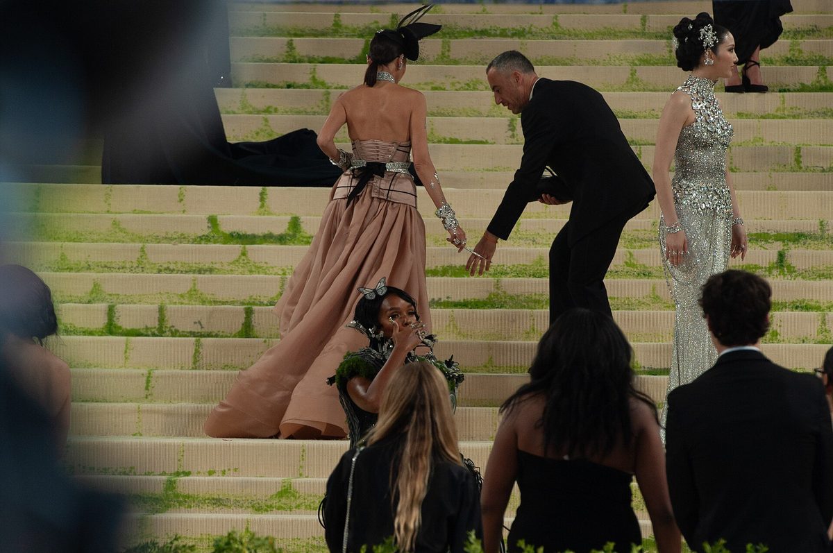 A guest in a silver sequined gown at the 2026 Met Gala — file photo illustrating sequin and metallic styling generally, not a holiday party